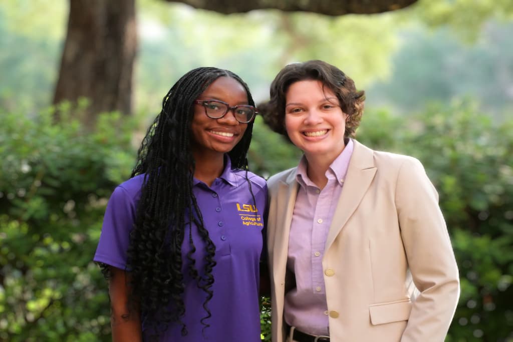 Amber Hayes stands with peer mentor, Tamia Thomas