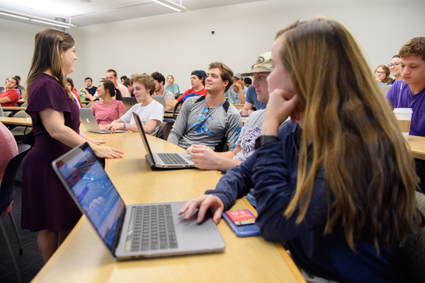 Students listen to lecture in classroom.